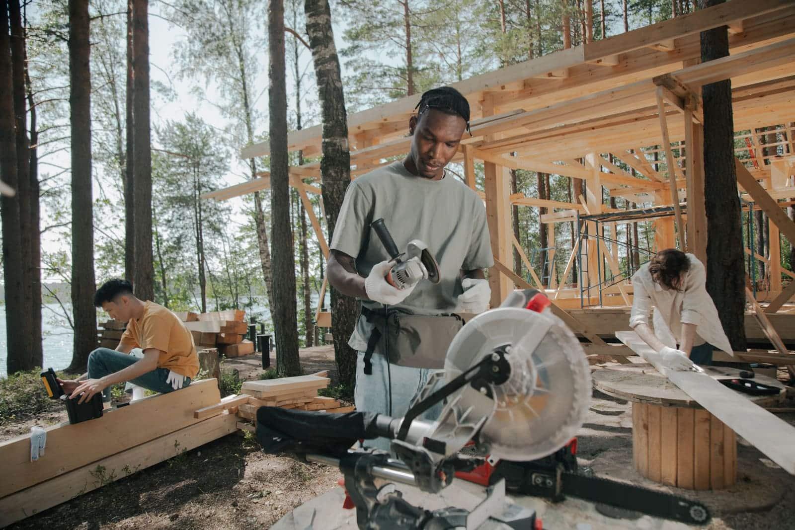 A construction crew framing a building on site.