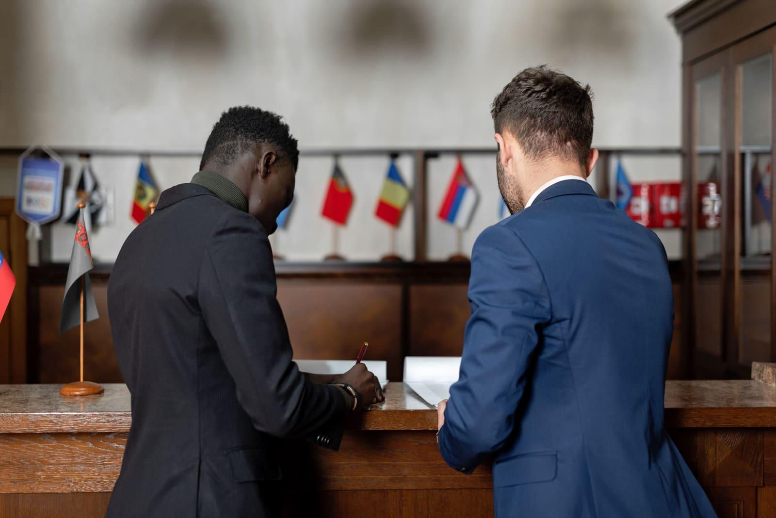 International business paperwork laid out on a desk.
