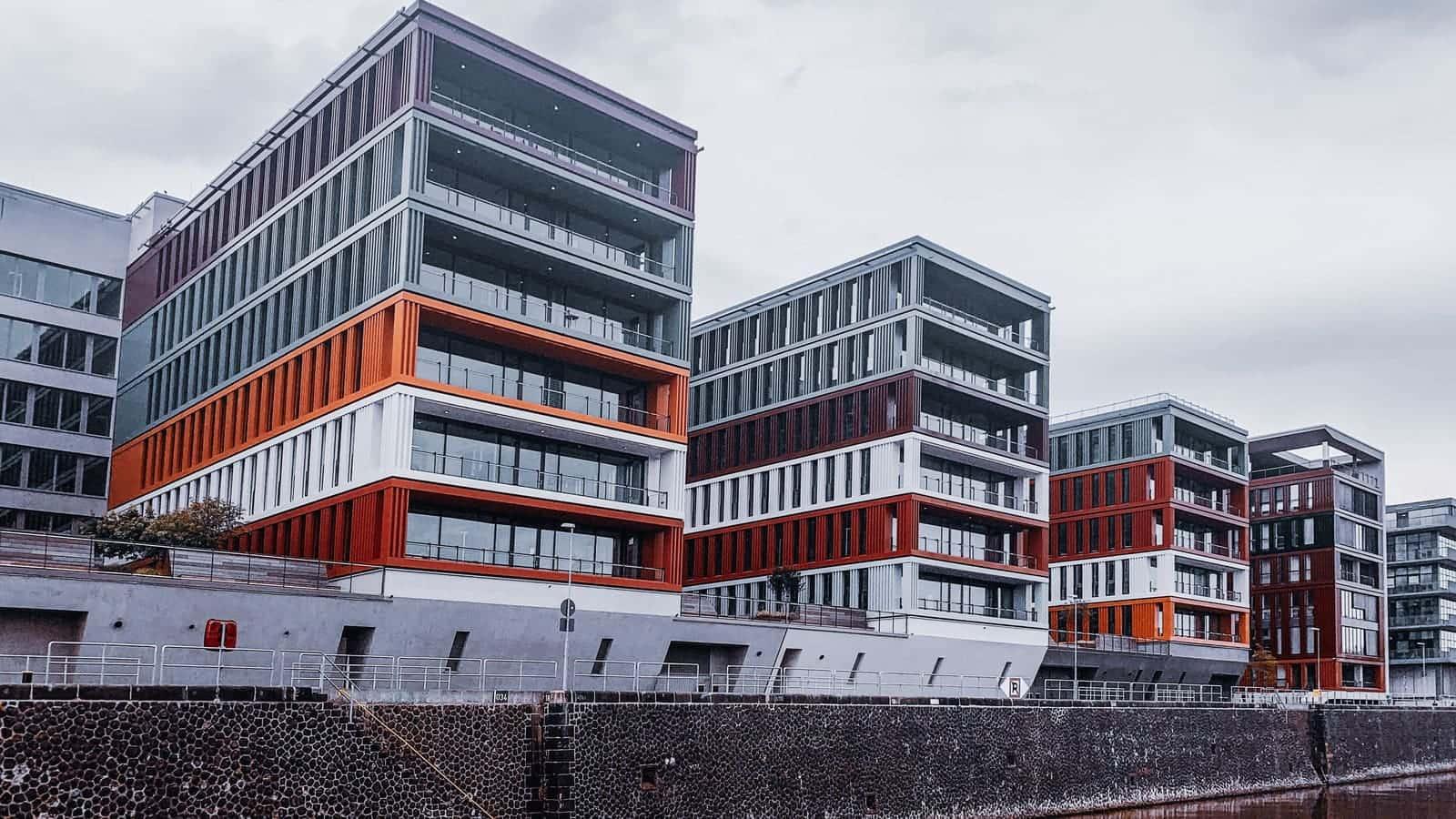 The exterior of a modern apartment building.